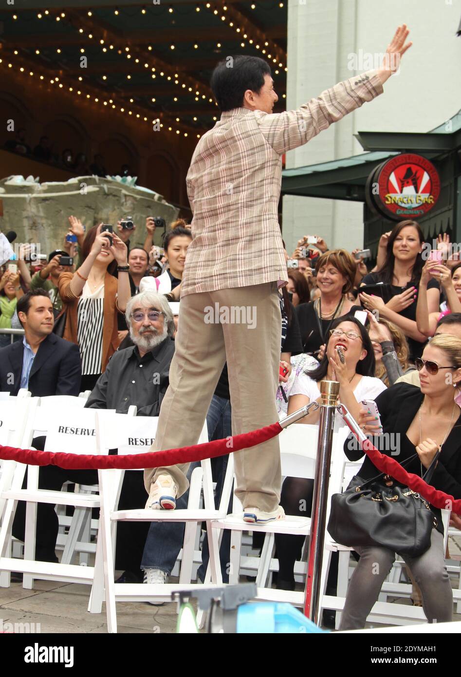 Jackie Chan attends his handprint and footprint ceremony at the TCL