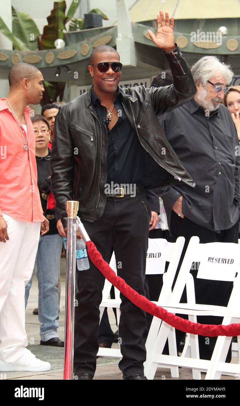 Chris Tucker attends the Jackie Chan handprint and footprint ceremony