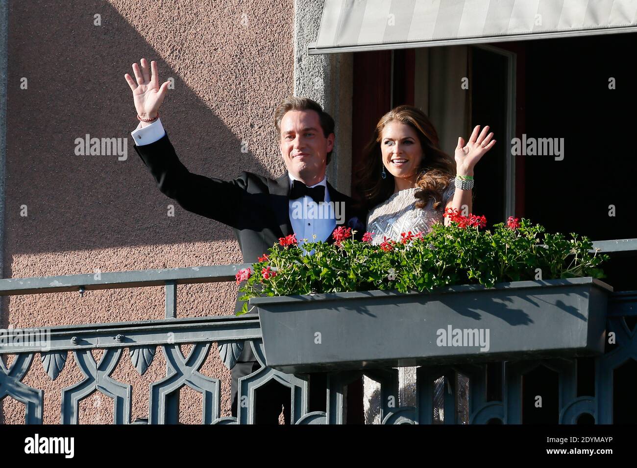 Swedish Princess Madeleine And Her Husband To Be Chris O Neill Wave From The Balcony Of The Grand Hotel In Stockholm Sweden On June 7 2013 Prior To A Dinner Party On The Eve Of