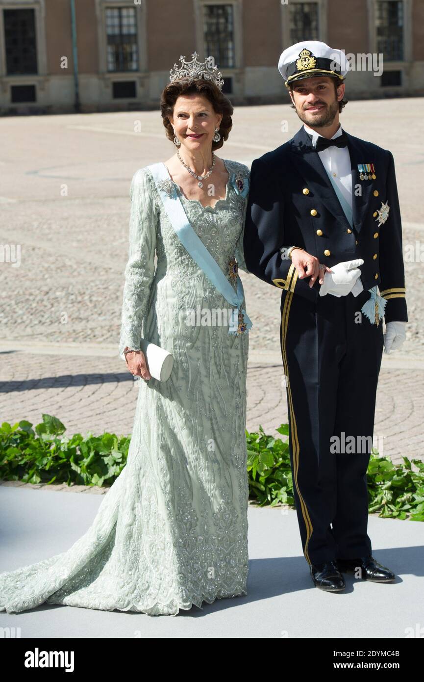 Queen Silvia and Prince Carl Philip of Sweden attending the wedding of  Swedish Princess Madeleine and Chris O'Neill at the Chapel of the Royal  Palace in Stockholm, Sweden, 08 June 2013. Photo