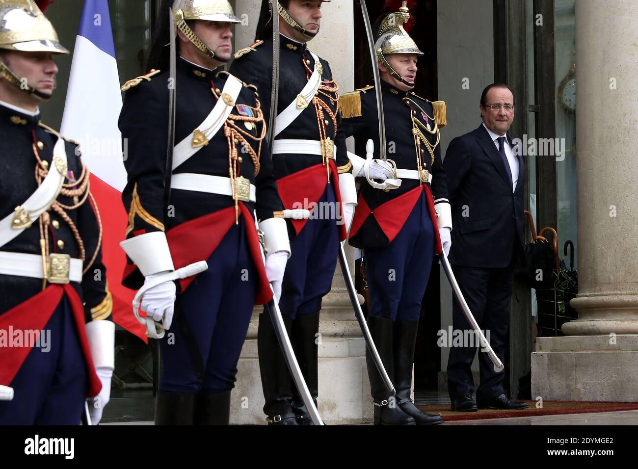 French President Francois Hollande waits to welcome Dubai ruler Sheikh Mohammed bin Rashid al-Maktoum prior to their meeting at the Elysee Palace, in Paris, France on June 13, 2013. Photo by Stephane Lemouton/ABACAPRESS.COM Stock Photo
