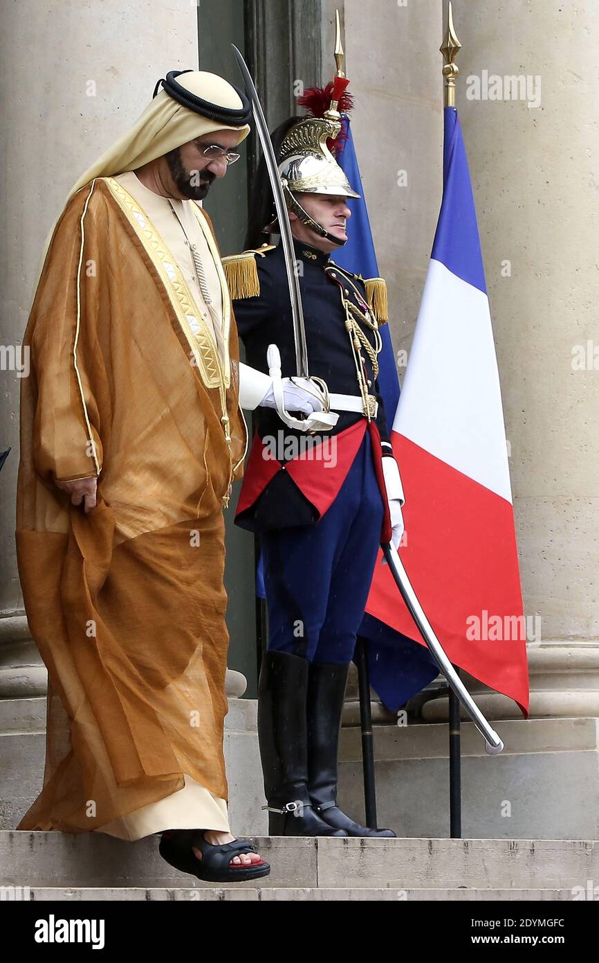 Dubai ruler Sheikh Mohammed bin Rashid al-Maktoum leaves the Elysee Palace after a meeting with French President Francois Hollande, in Paris, France on June 13, 2013. Photo by Stephane Lemouton/ABACAPRESS.COM Stock Photo
