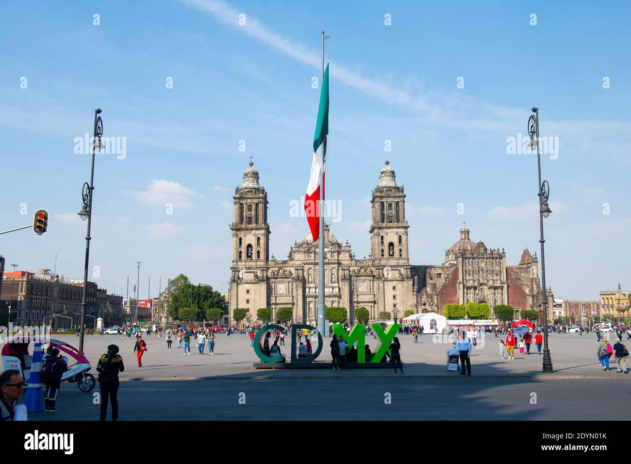 Mexico National Flag on Zocalo Constitution Square and Metropolitan Cathedral in the morning, Mexico City CDMX, Mexico. Stock Photo