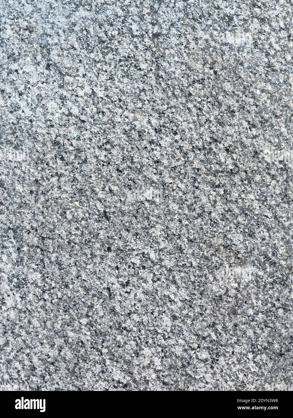 Grey stone wall textured background close-up Stock Photo