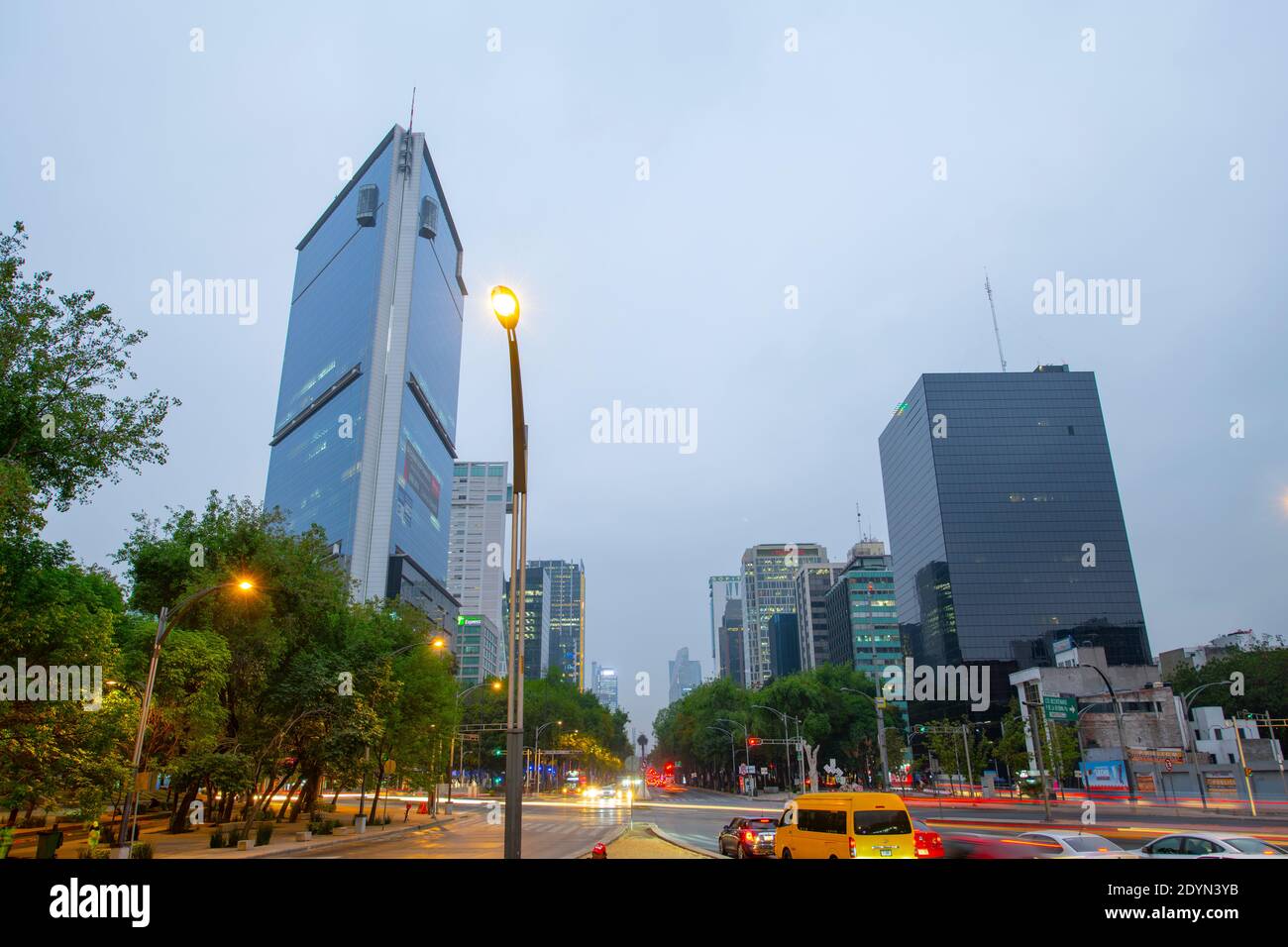 Modern skyscraper buildings in the morning on Avenida Paseo de la Reforma Avenue at Monument of Cuauhtemoc, Mexico City CDMX, Mexico. Stock Photo