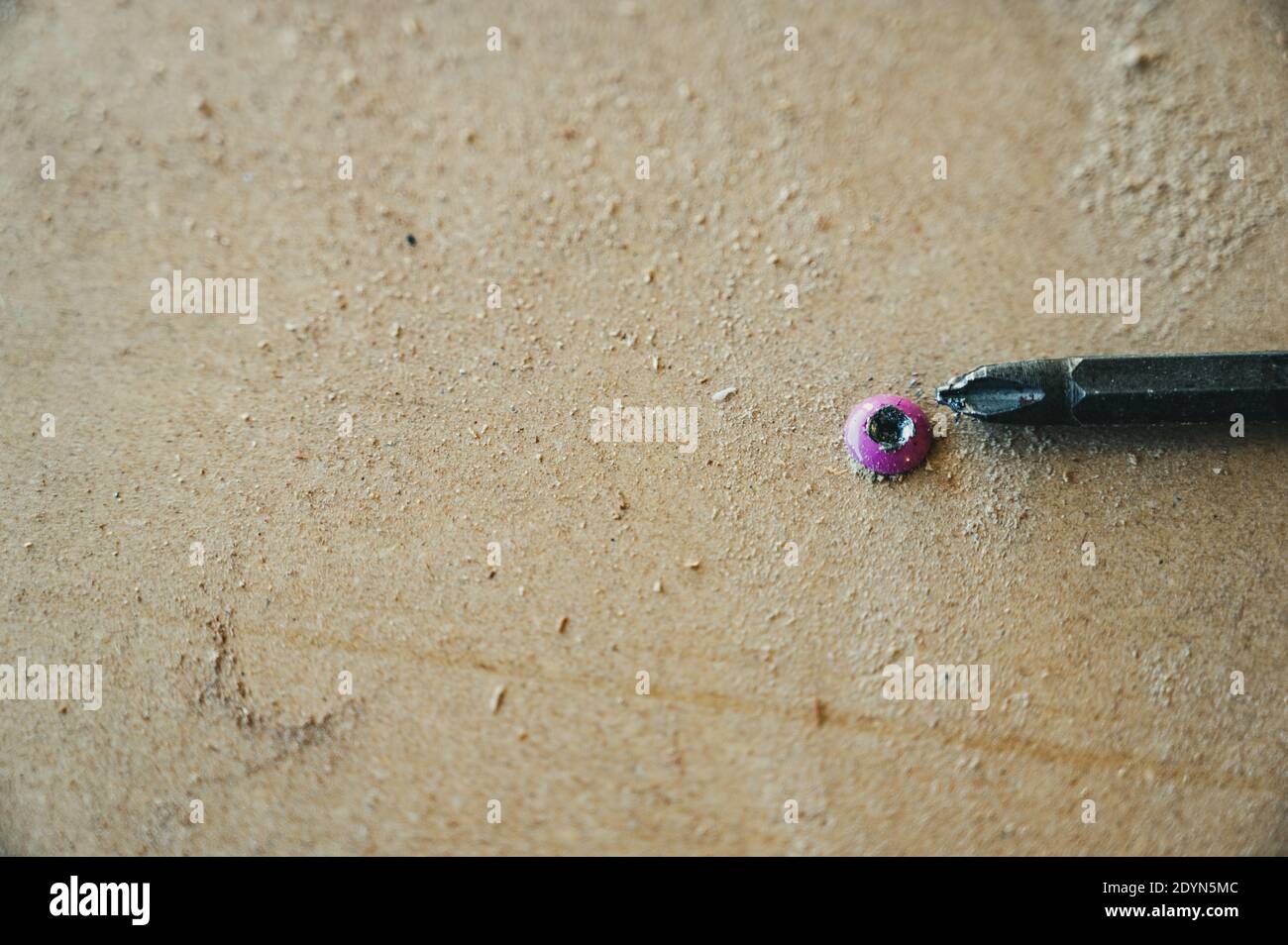 Damaged screw head caused by using the wrong bit and speed to install