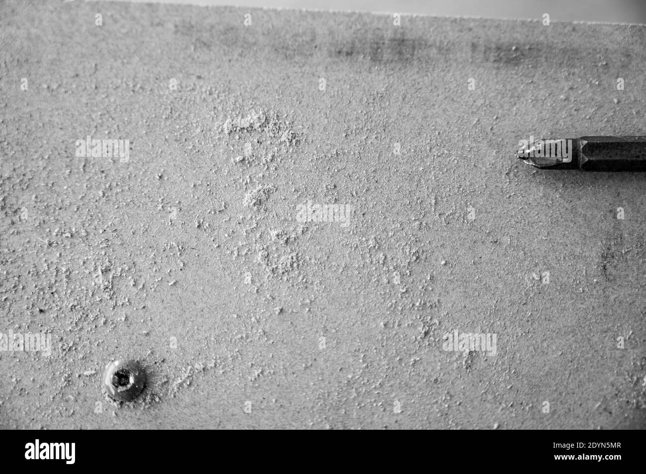 Damaged screw head caused by using the wrong bit and speed to install