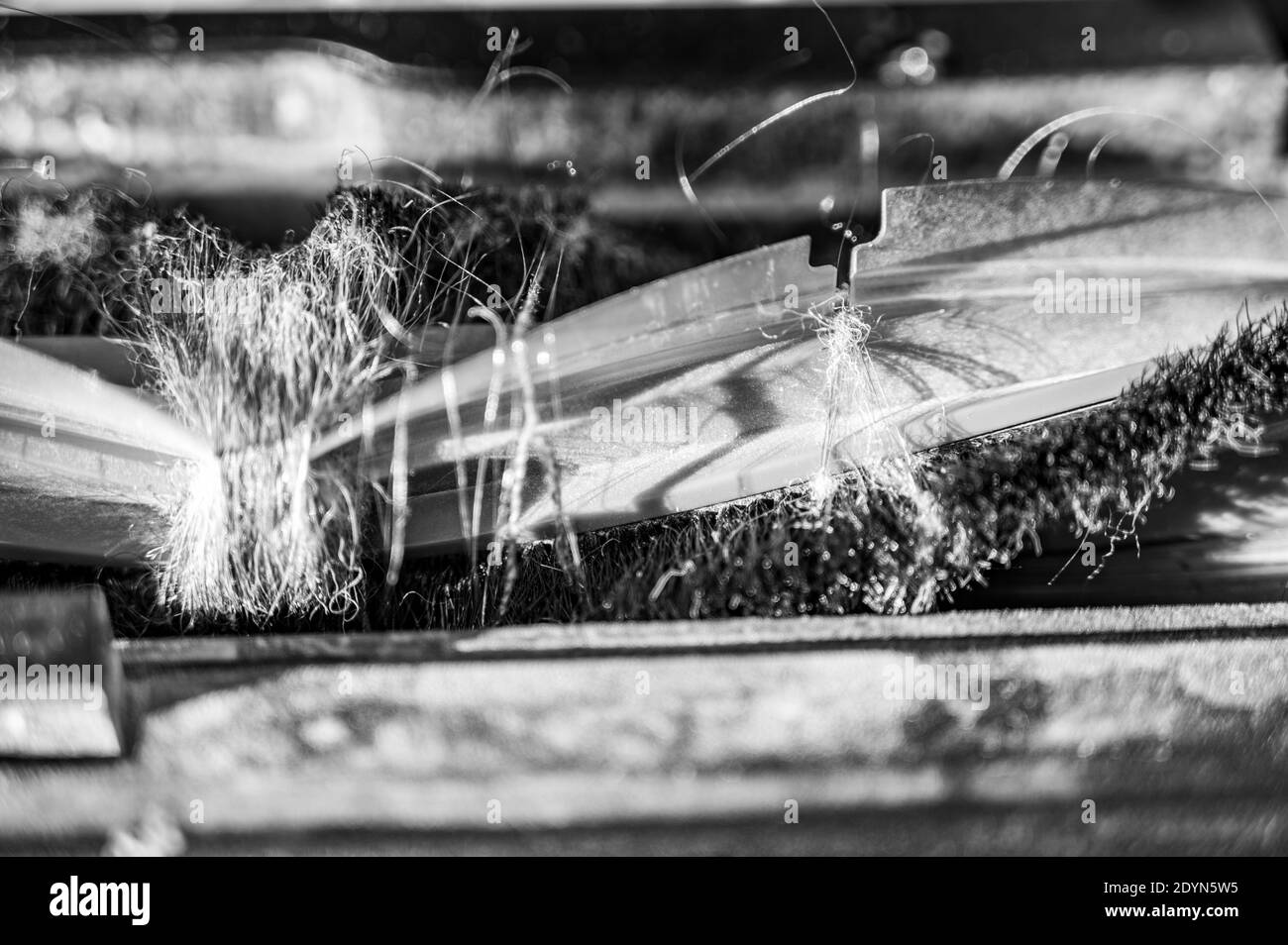 Vacuum plugged from picking up long hair until the rollers stop working Stock Photo Alamy