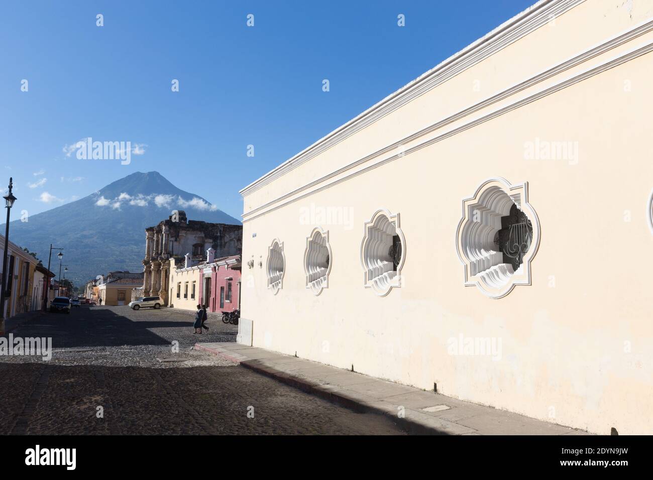 Antigua, Guatemala Agua Volcano, Iglesia del Carmen, and colonial facades Stock Photo
