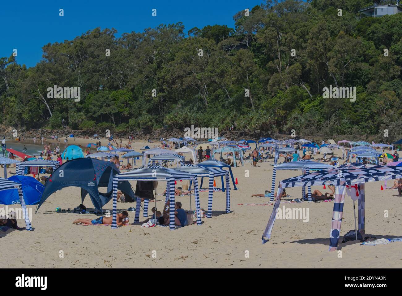 Noosa, Queensland, Australia - December 27, 2020: People enjoying the beach in Noosa during the Christmas school holidays. Stock Photo