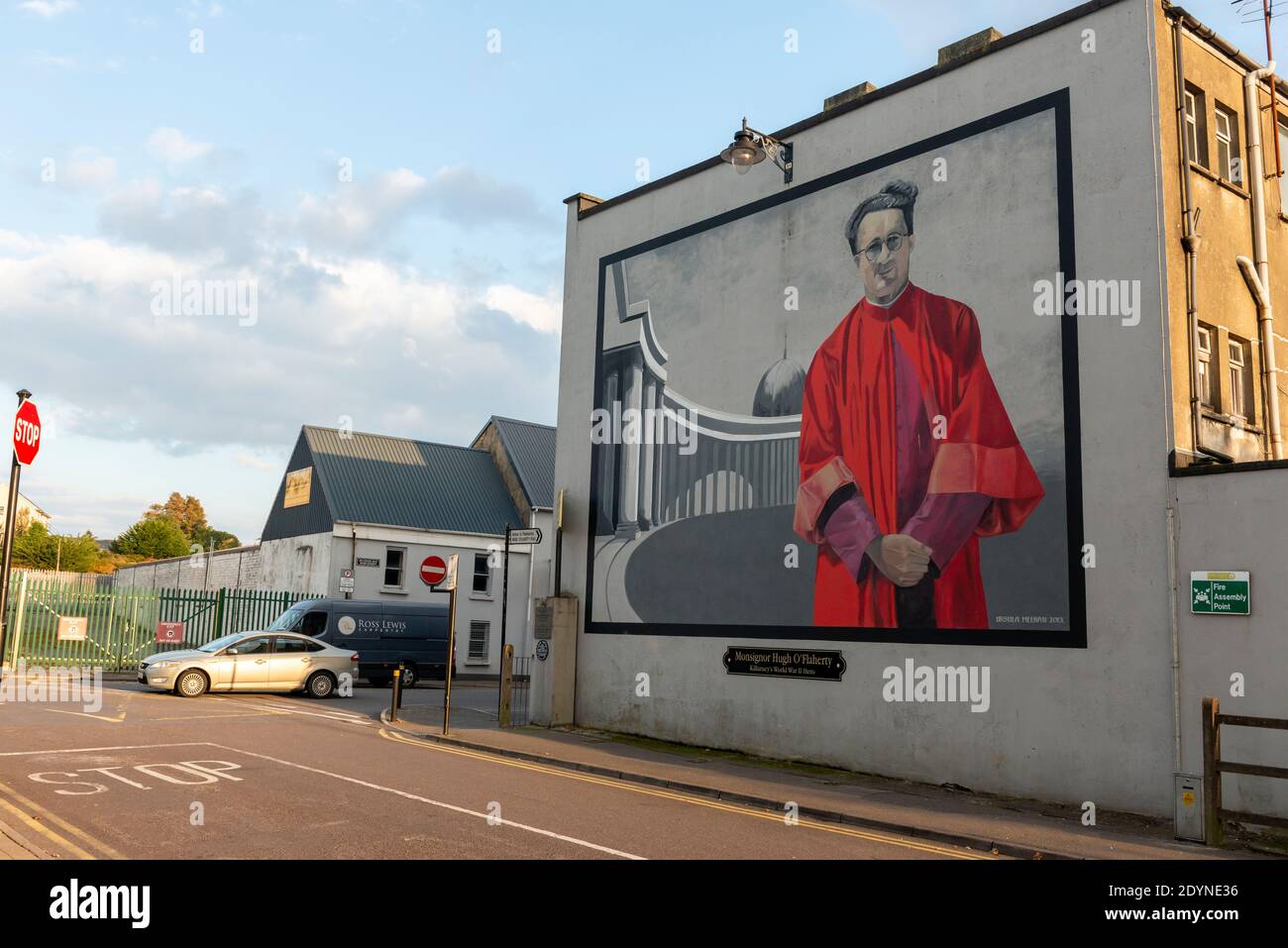 Monsignor Hugh O'Flaherty mural and art work by Ursula Meehan and Commemorative Plaque in O'Flaherty Street Killarney County Kerry Ireland Stock Photo