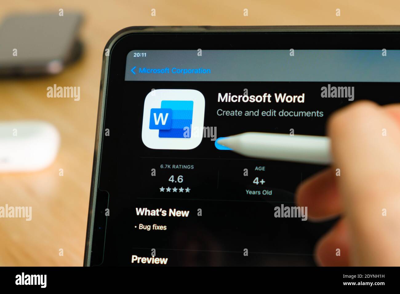 Microsoft Word logo shown by apple pencil on the iPad Pro tablet screen.  Man using application on the tablet. December 2020, San Francisco, USA  Stock Photo - Alamy