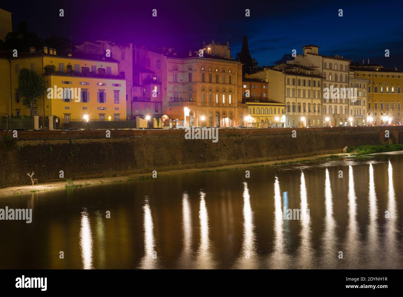 Old city embankment in the night illumination. Florence, Italy Stock Photo