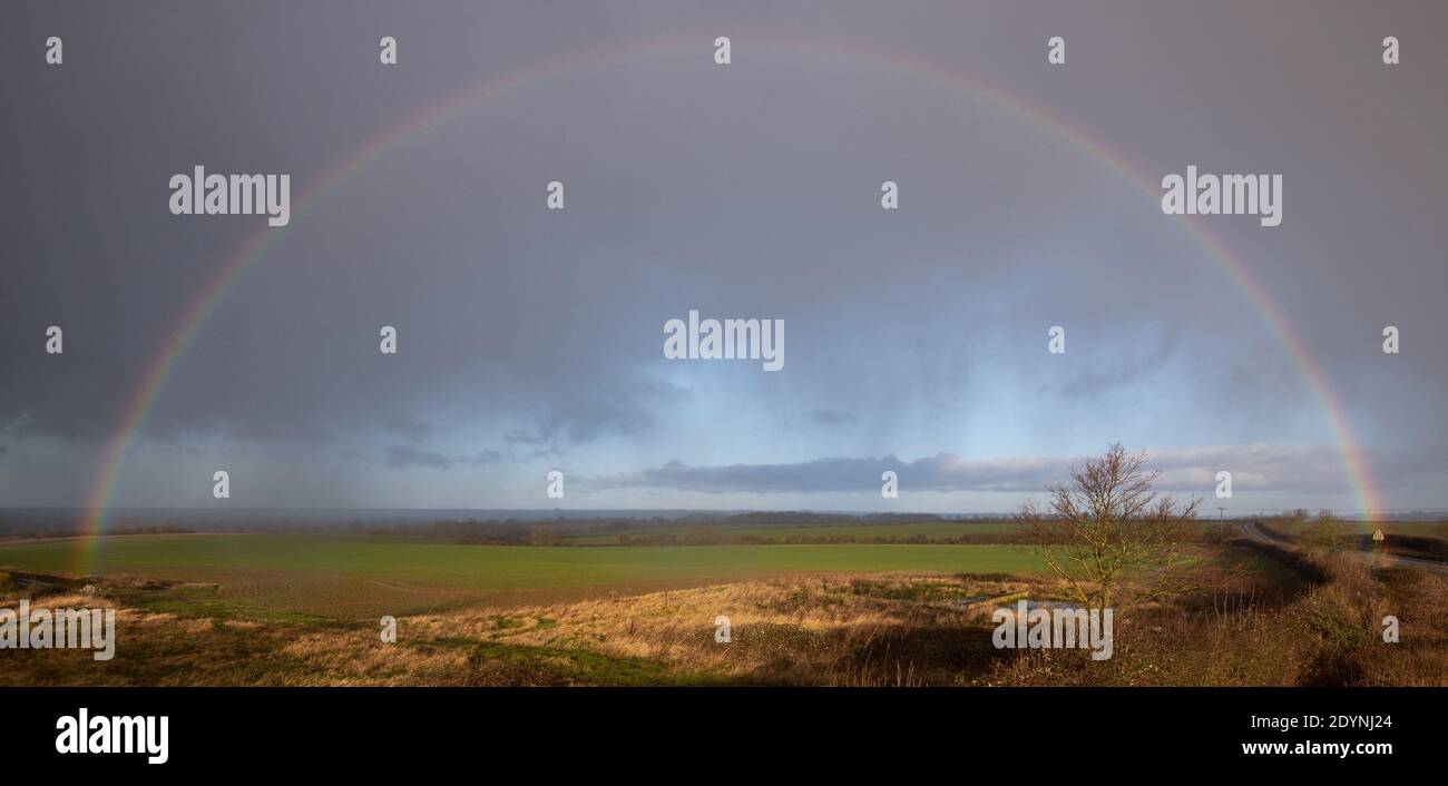 A rainbow over Great Doddington in Northamptonshire, after residents living near the River Great Ouse in north Bedfordshire were 'strongly urged' to seek alternative accommodation due to fears of flooding. Stock Photo