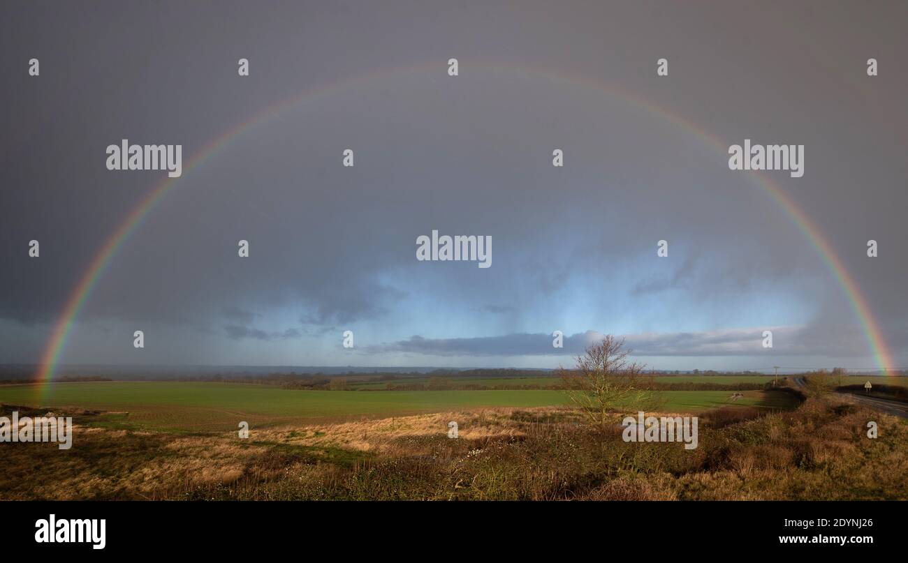 A rainbow over Great Doddington in Northamptonshire, after residents living near the River Great Ouse in north Bedfordshire were 'strongly urged' to seek alternative accommodation due to fears of flooding. Stock Photo
