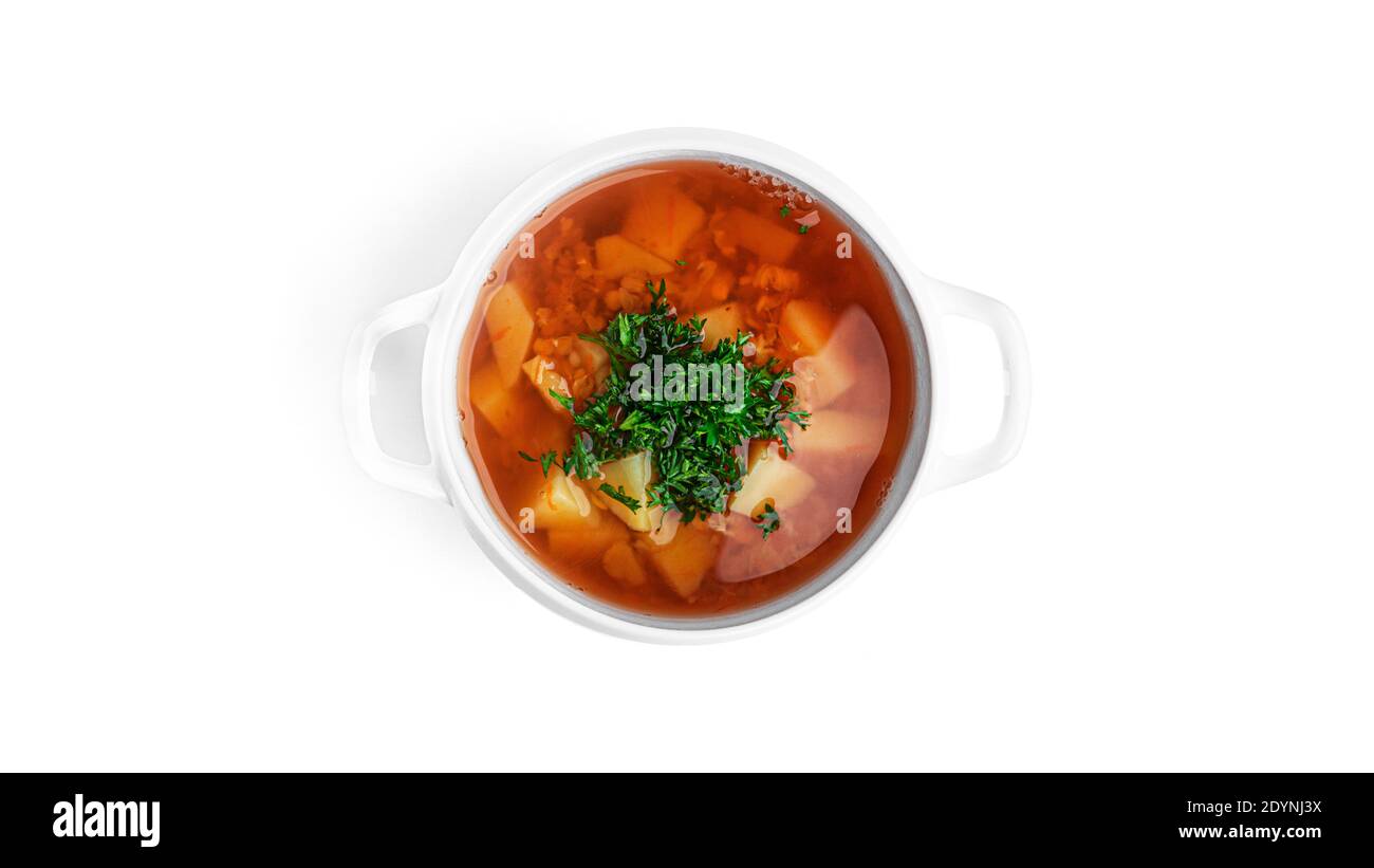 Lentil soup with greenery isolated on white background. High quality photo Stock Photo