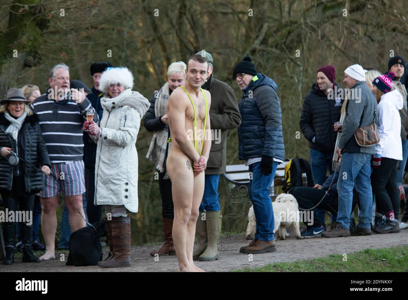 The annual Christmas morning dip held at Black root pool in Sutton Park on Christmas day morning. A man in a mankini taking part. It was unsure if the swim would go ahead due to Covid restrictions but many braved the weather to take part. Stock Photo