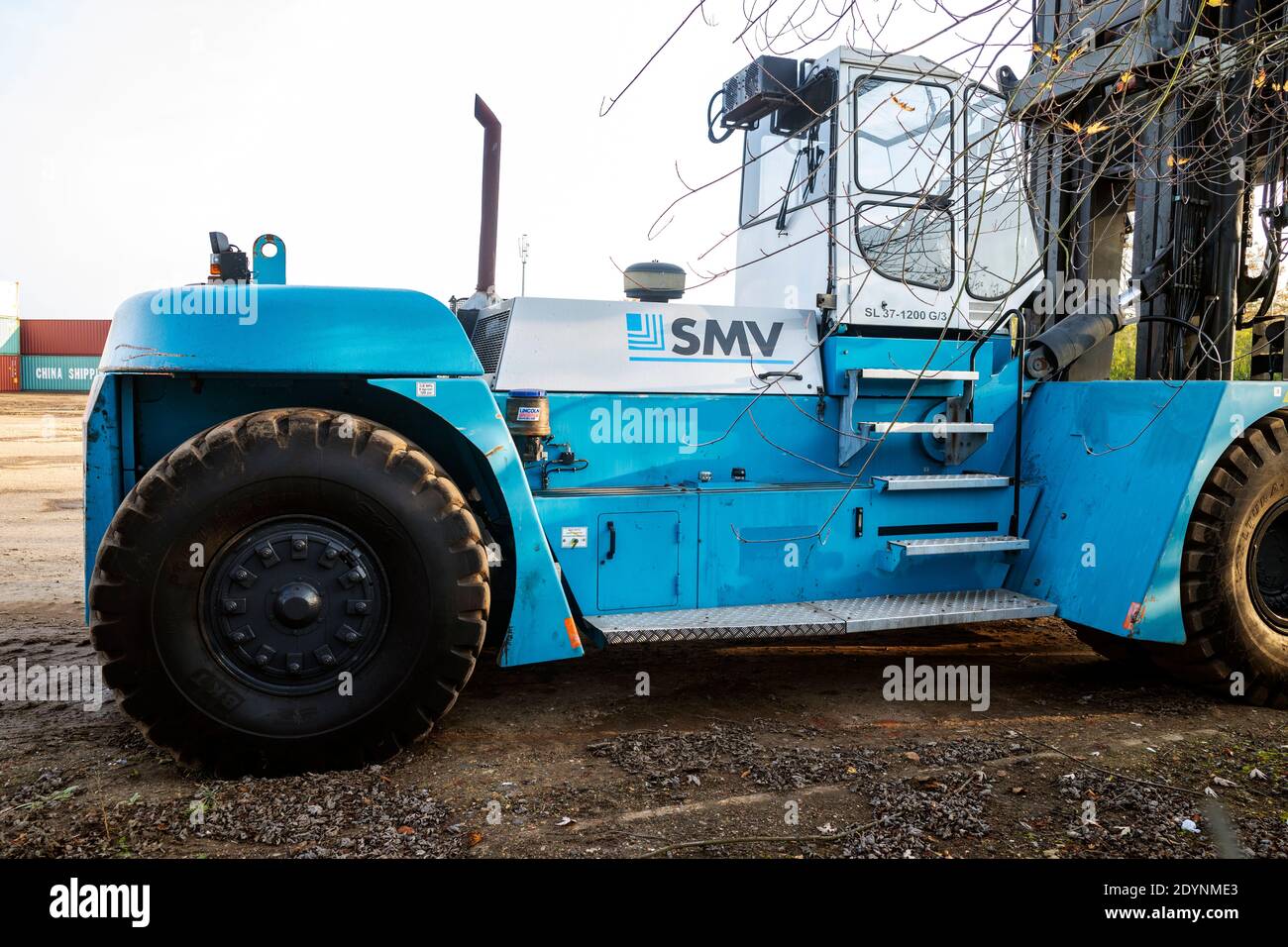 Forklift truck used for stacking shipping containers Stock Photo - Alamy
