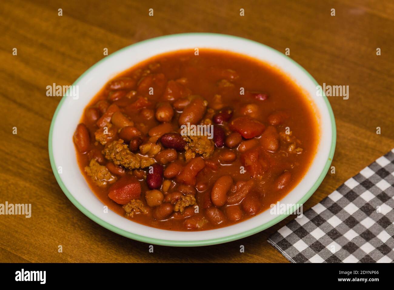 bowl of homemade chili on the table ready for your dining pleasure Stock Photo