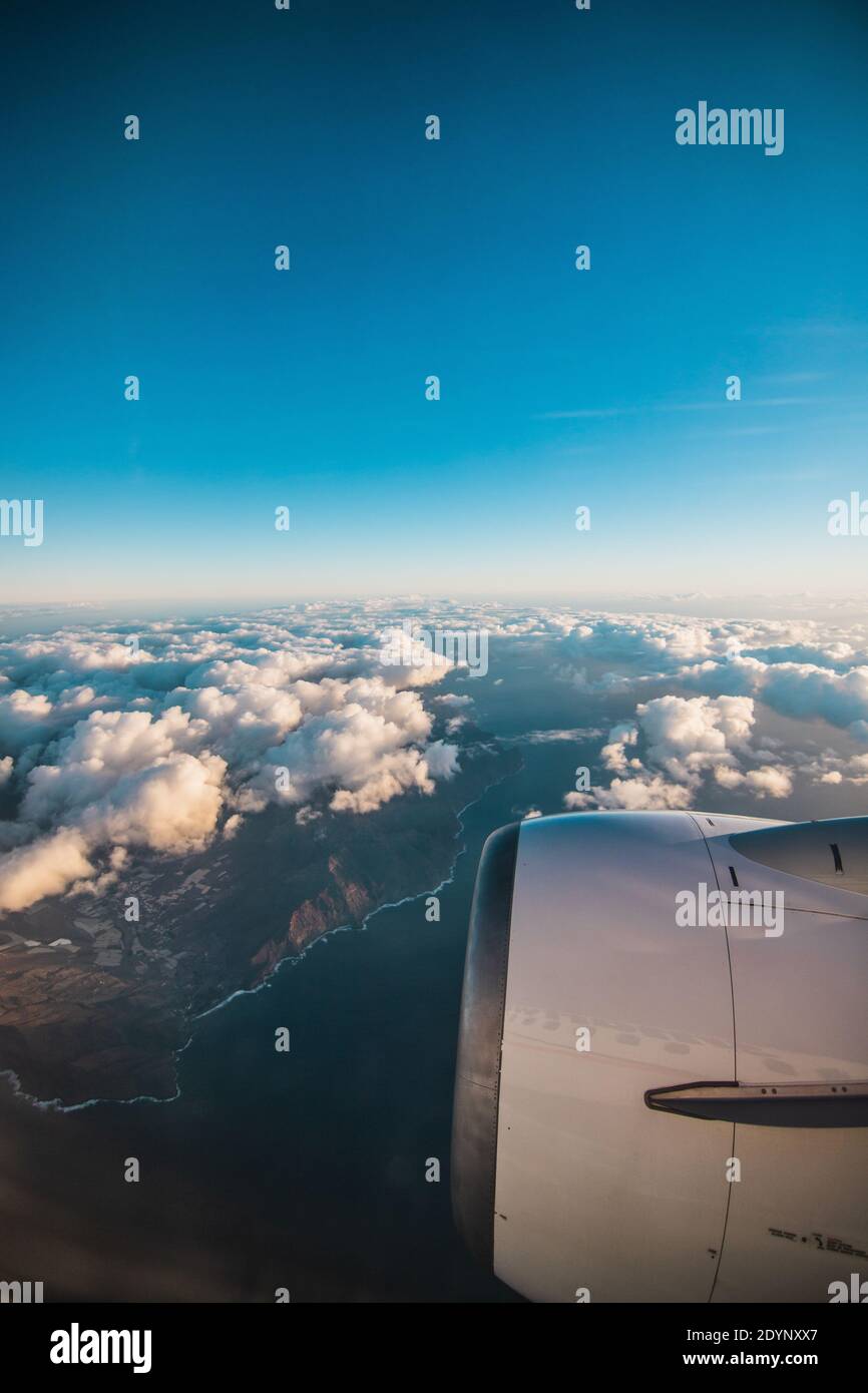 Clouds and sky as seen through window of in airplane Stock Photo - Alamy