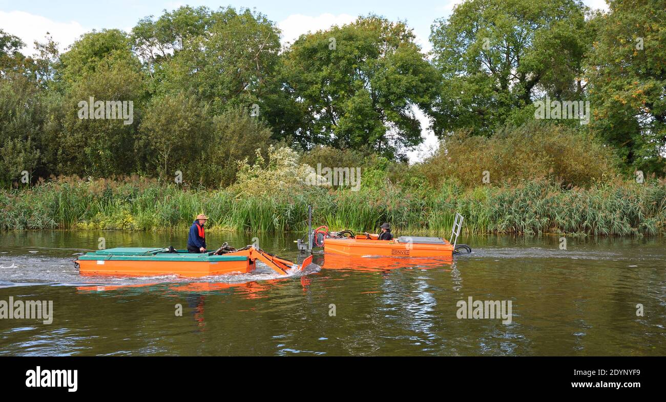 : River maintenance  Aquatic Weed Cutting and Removal Stock Photo