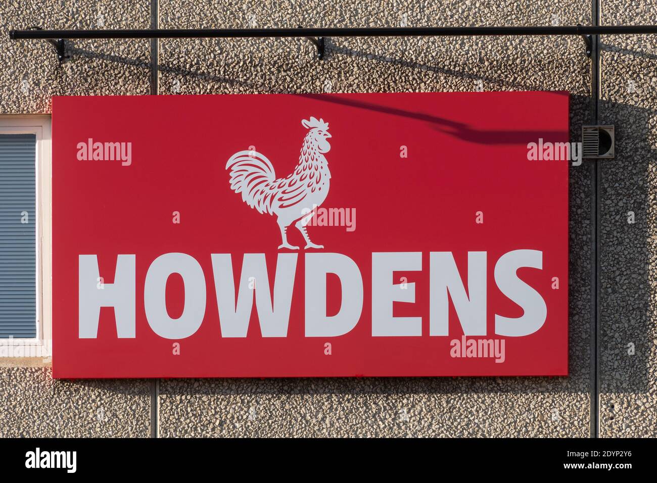 Howdens Joinery co. sign at a branch of the trade kitchen supplier, UK Stock Photo
