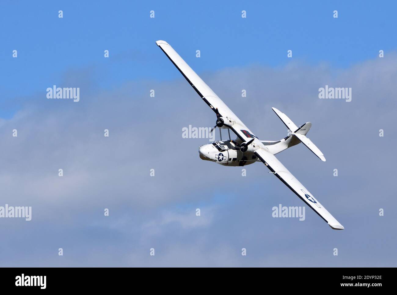 Vintage  PBY-5A Catalina Miss Pick Up (G-PBYA) Flying Boat  in Flight. Stock Photo