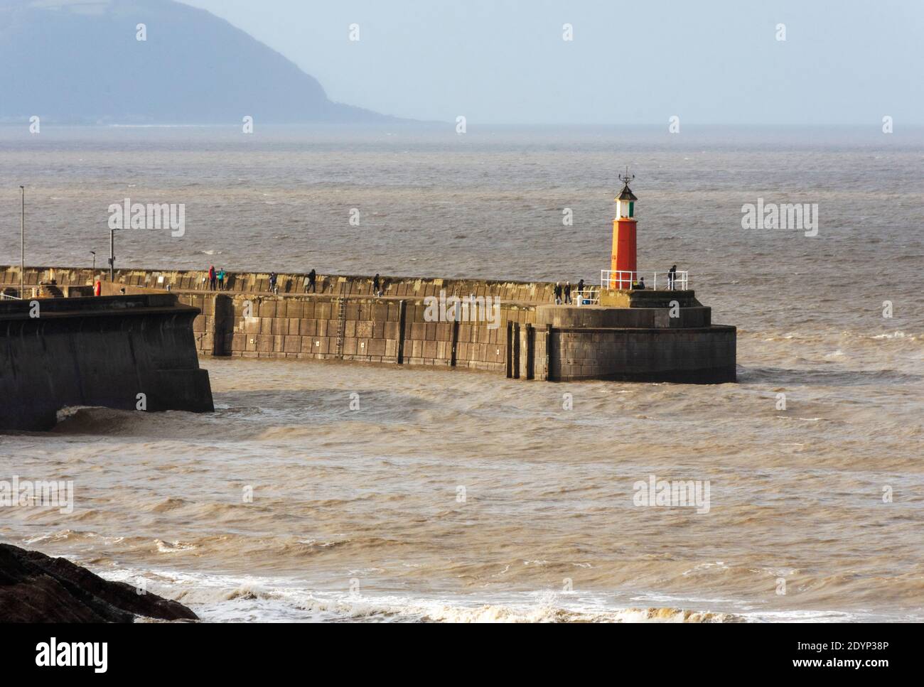 The lighthouse at Watchet harbour entrance, in Somerset Stock Photo