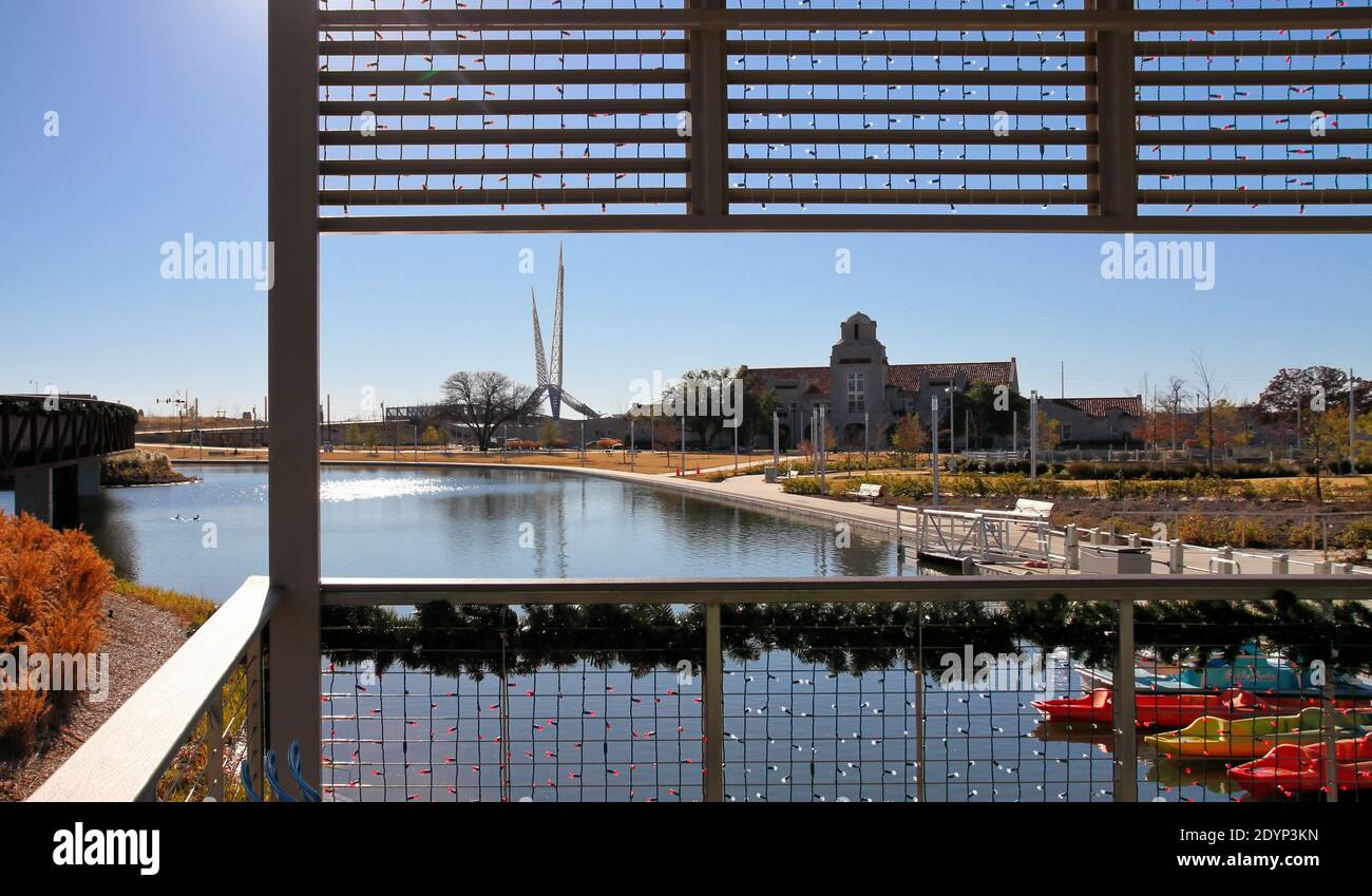 Looking out across the pond from the boathouse at Scissortail Park in downtown Oklahoma City on Christmas Day. Stock Photo