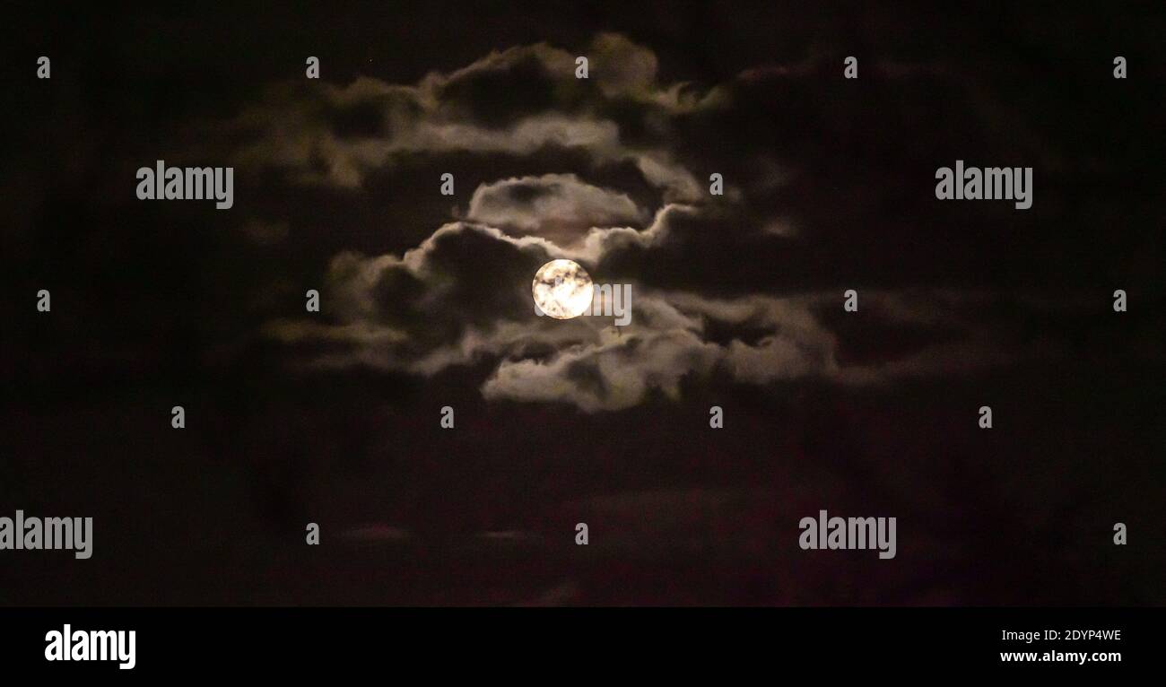 full moon in the sky with clouds landscape Stock Photo - Alamy