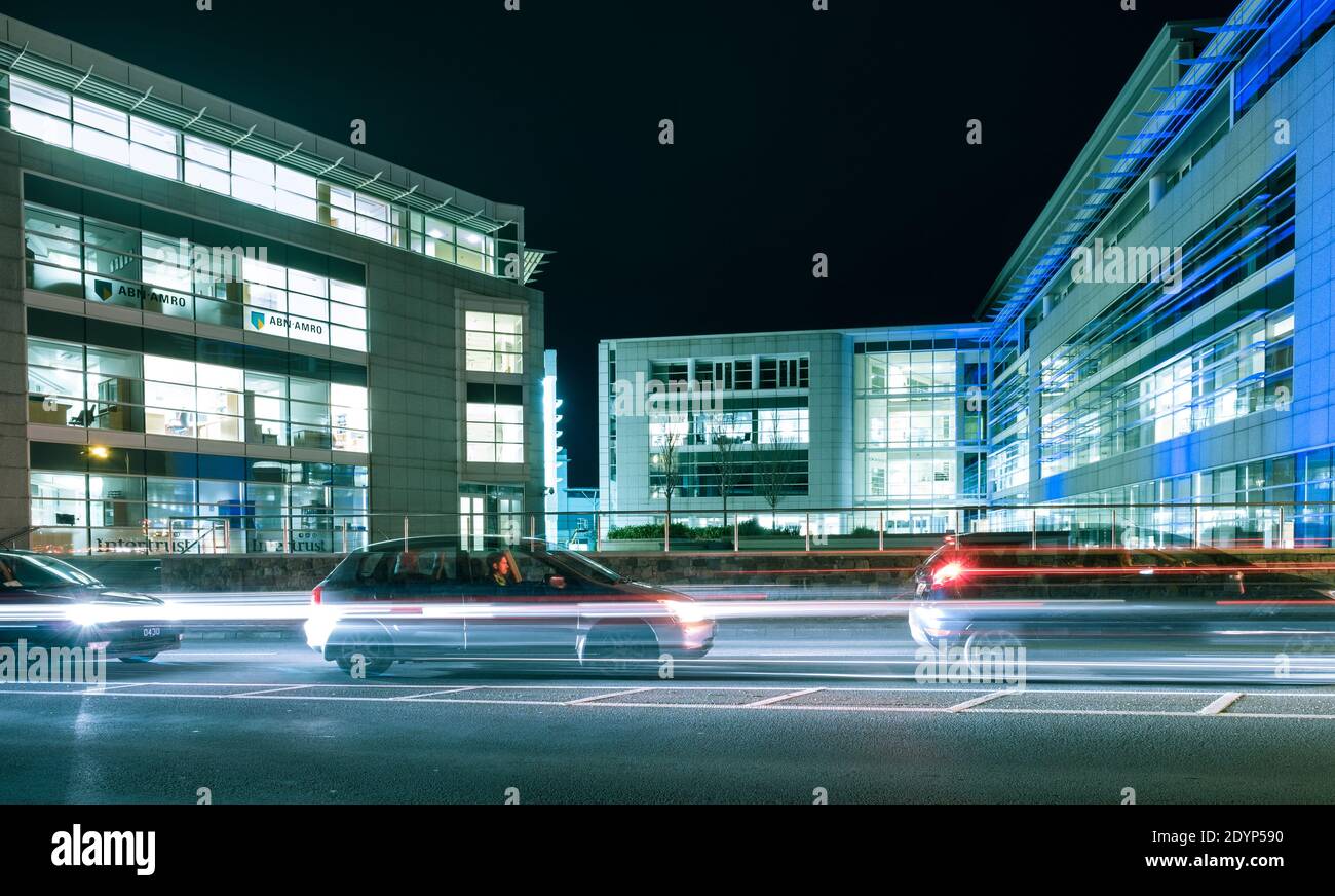 Office buildings at night time, Trafalgar Court, Guernsey Stock Photo