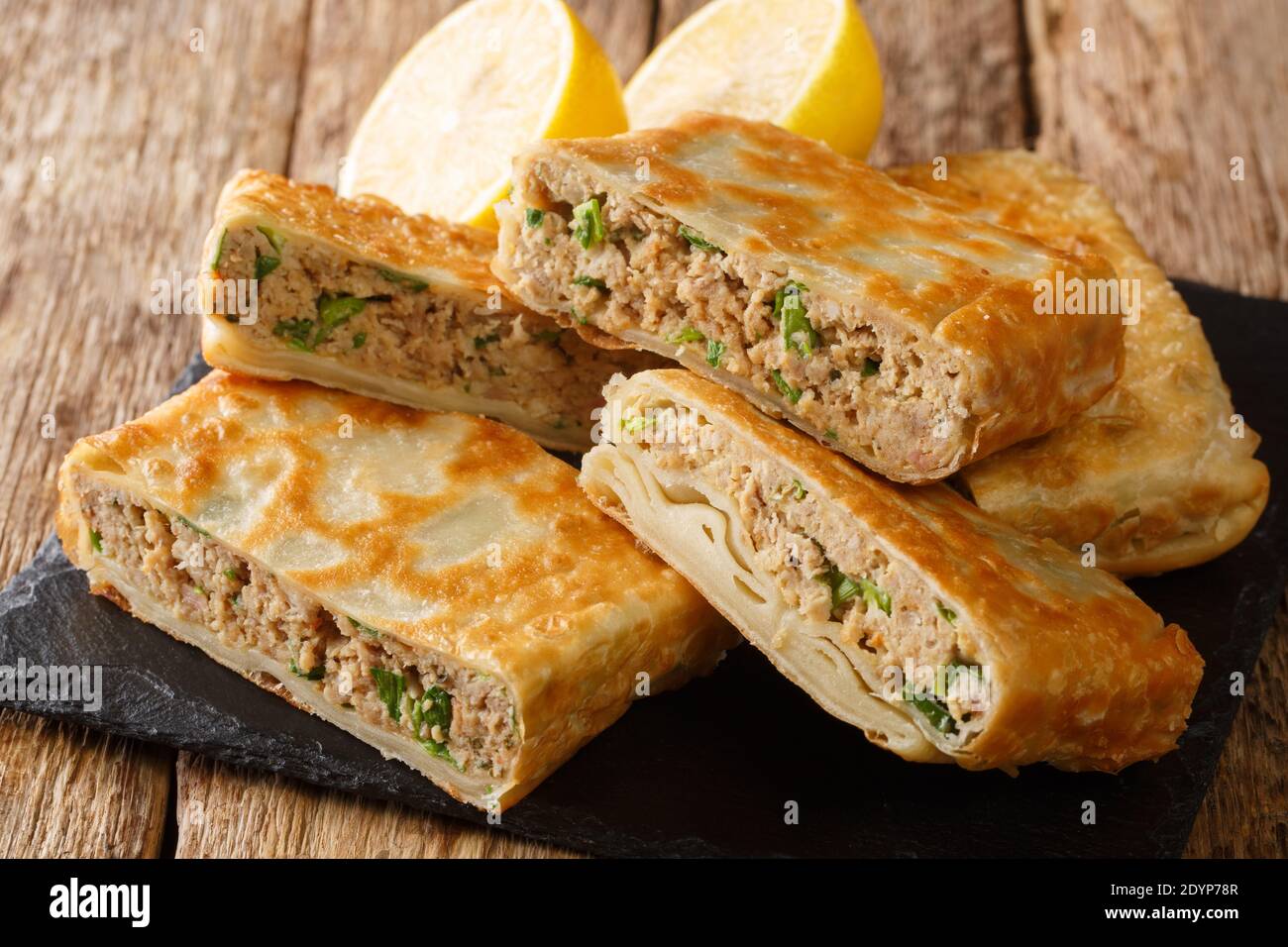 Tasty Mutabbaq Middle Eastern folded panfried flatbreads, stuffed with