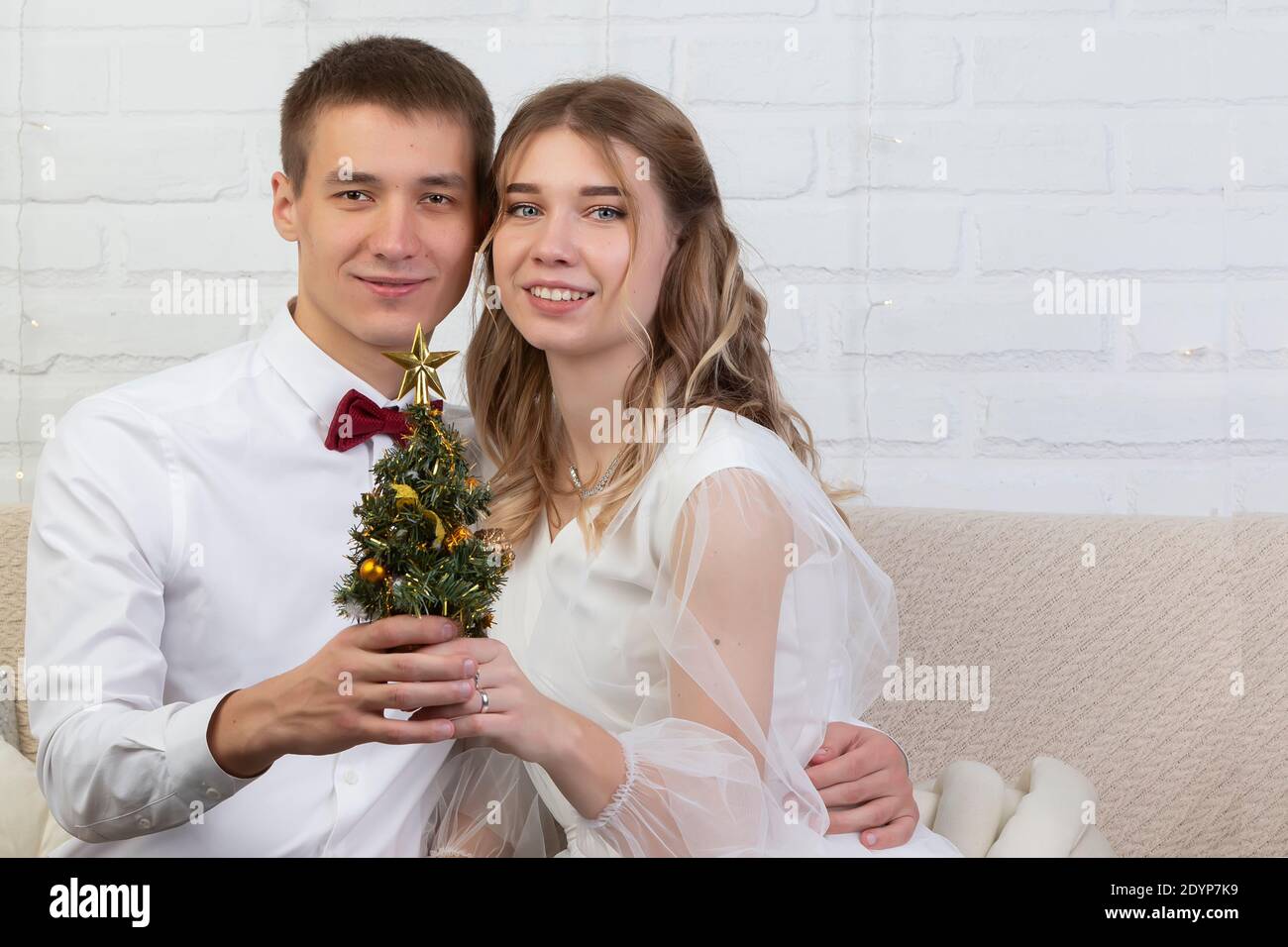 Bride sitting on couch hi-res stock photography and images - Alamy