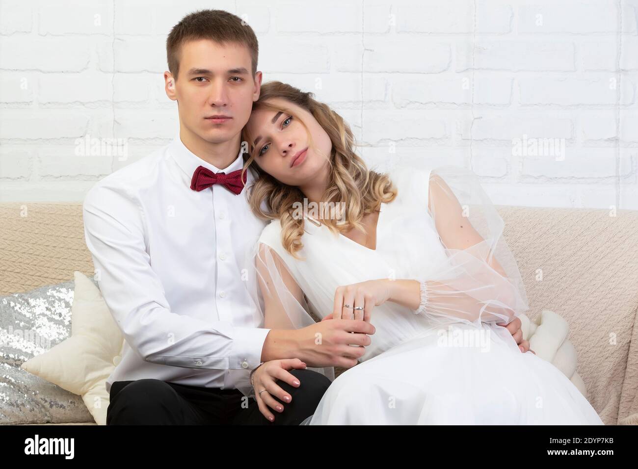 Bride sitting on couch hi-res stock photography and images - Alamy