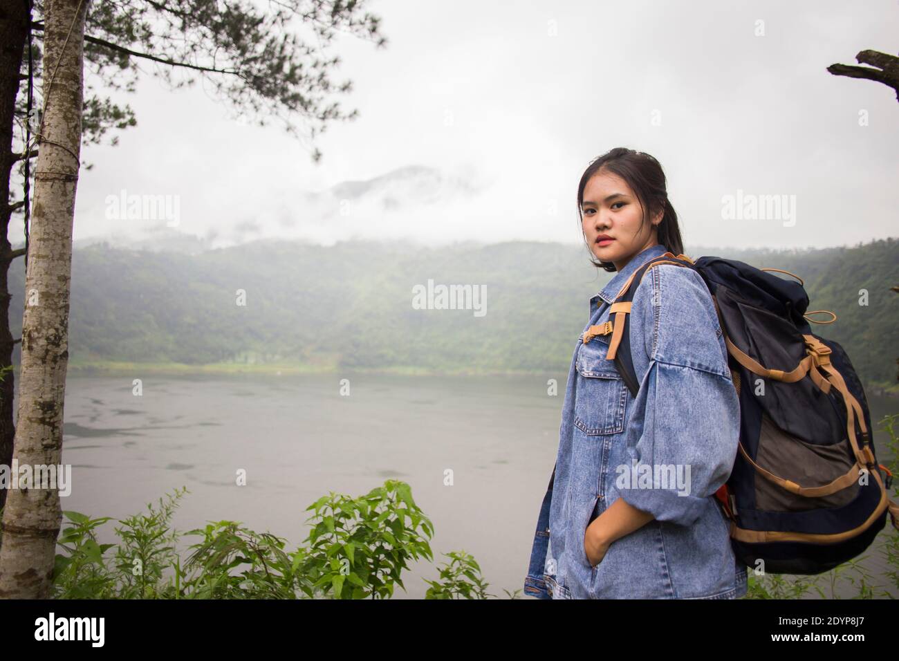 portrait of asian woman hiking in the nature Stock Photo - Alamy