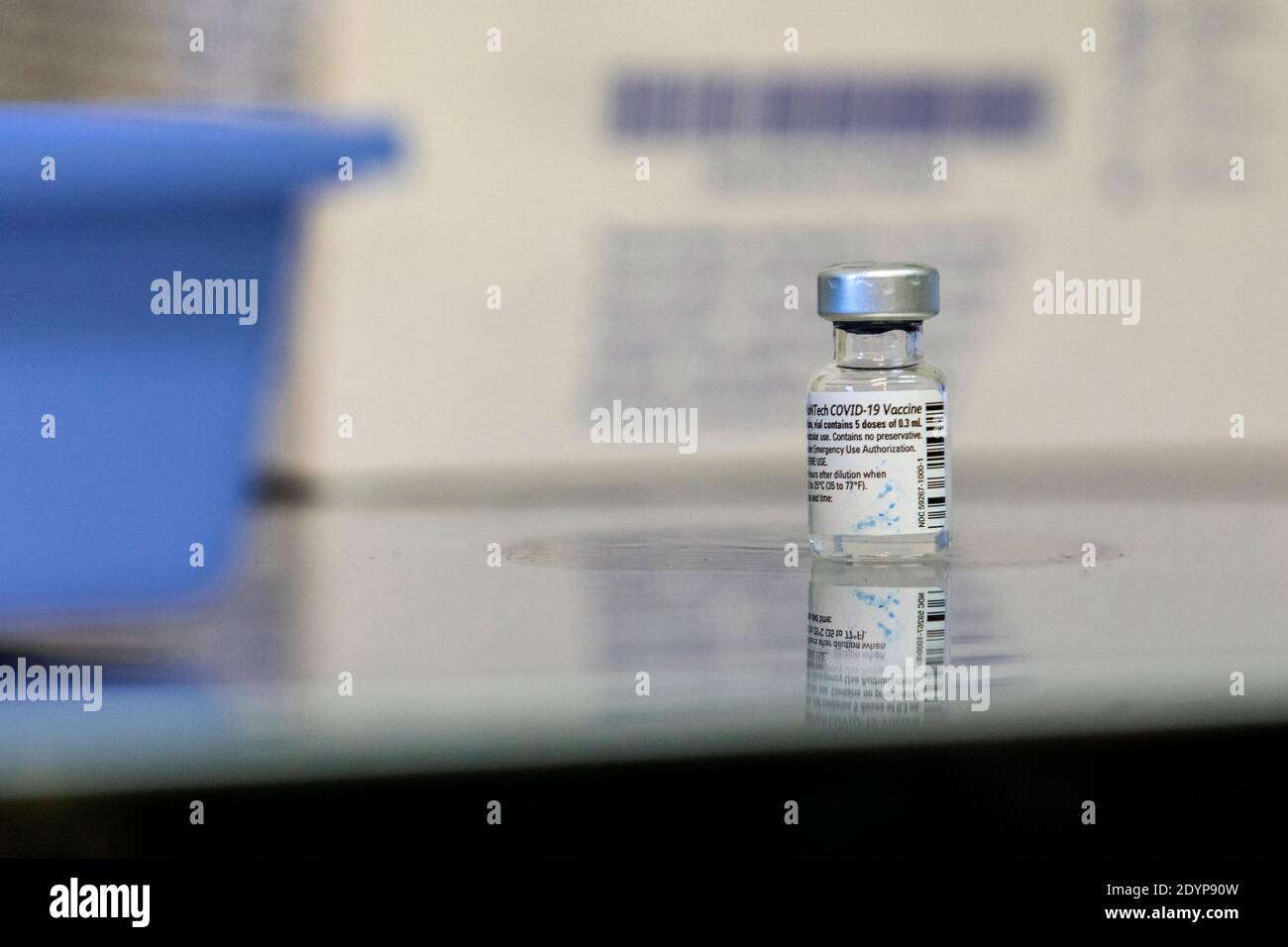 A vial of the vaccine produced by Pfizer / BioNTech at the Santa Maria hospital.Vaccination plans against Covid19 have started across Europe and health professionals at Santa Maria hospital are the first to receive the vaccine. Stock Photo
