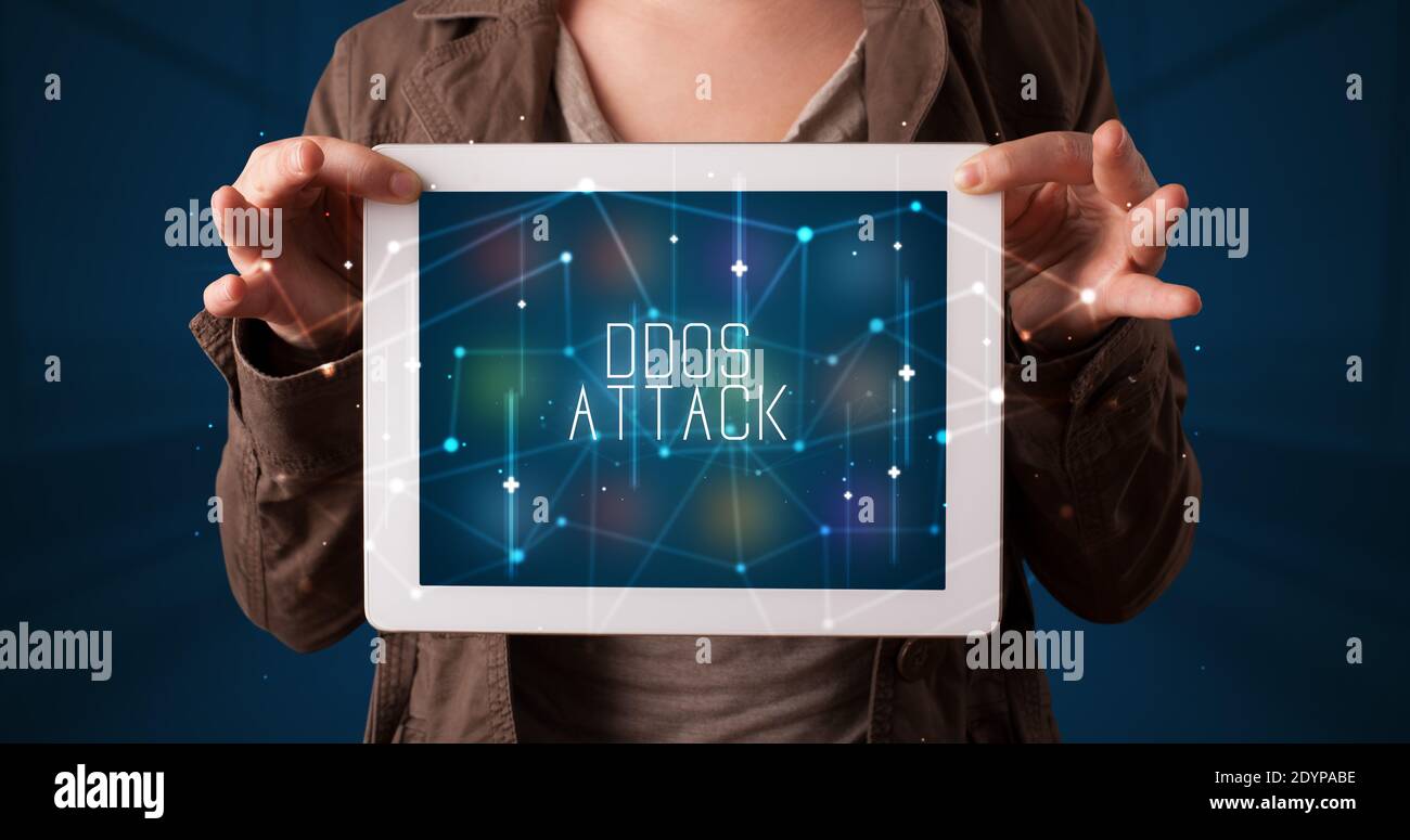 Young business person working on tablet and shows the digital sign ...