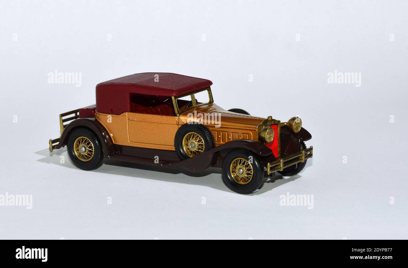 Toy diecast model car 1930 Packard Victoria a Matchbox yesteryear product by Lesney with white background. Stock Photo