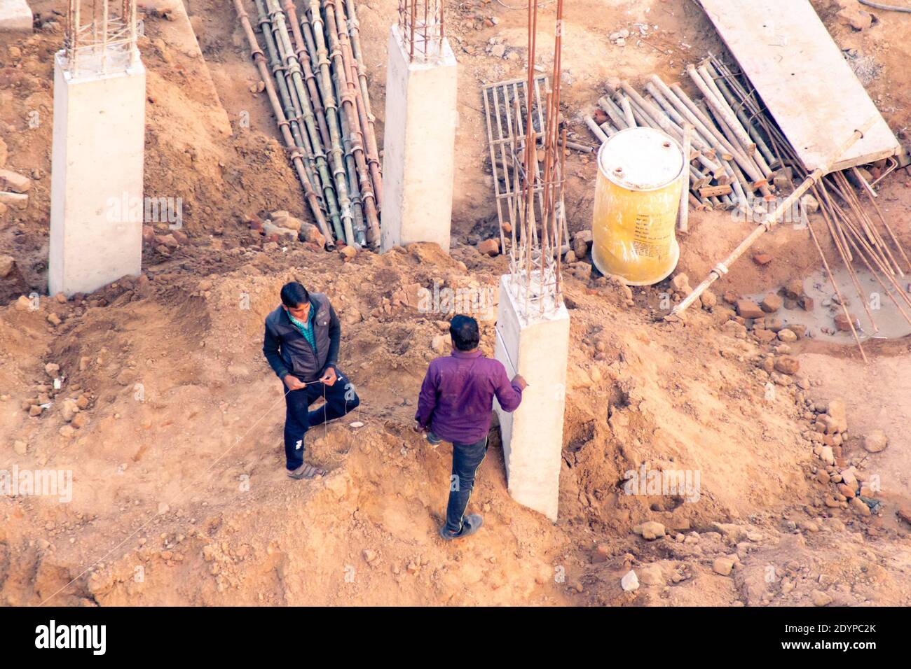 Construction workers civil engineers auditor developement authority men