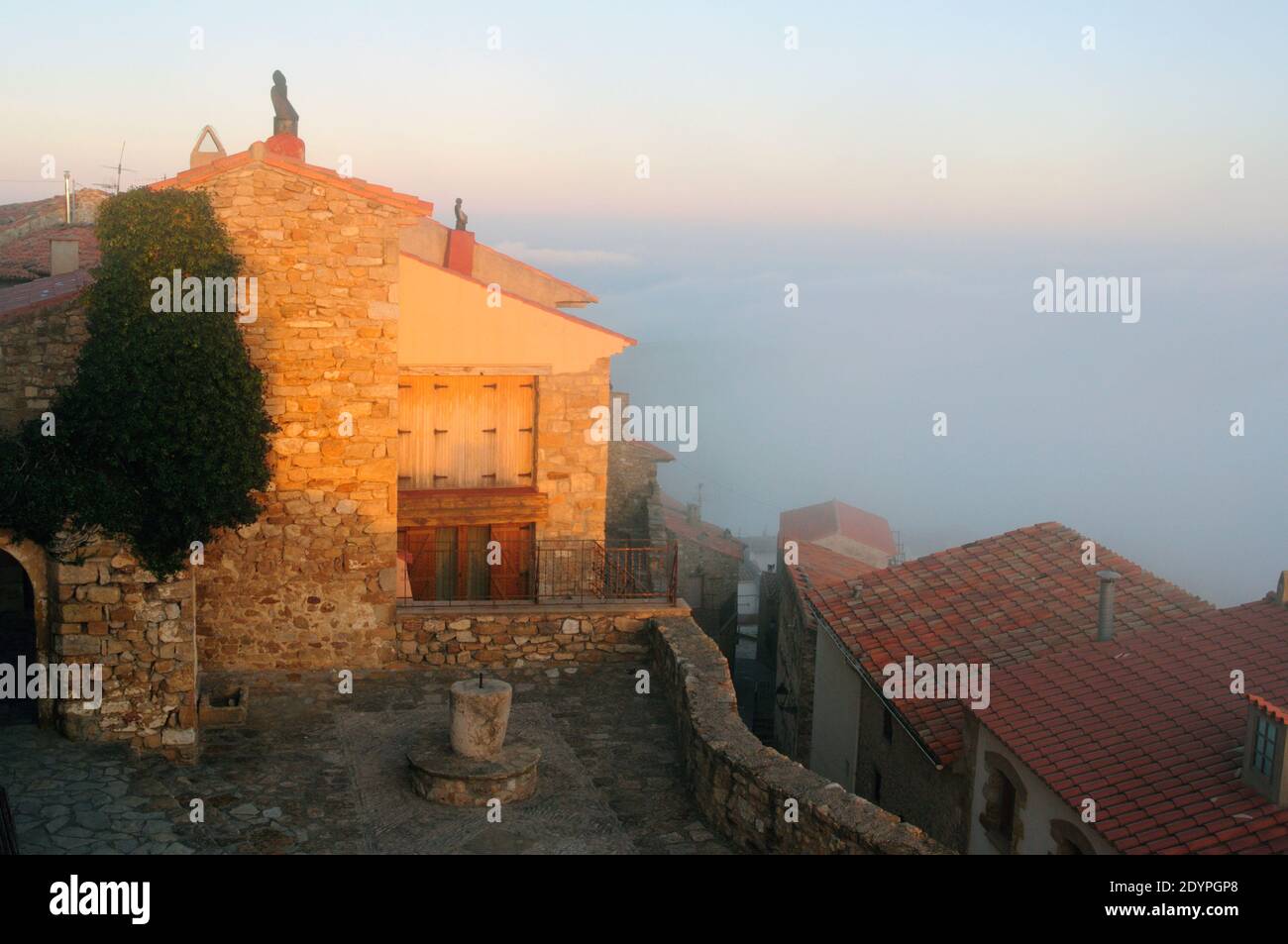 Foggy sunset at Culla, Castellón, Spain Stock Photo
