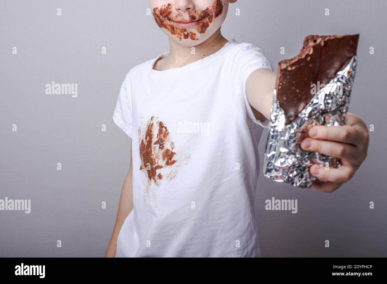 chocolate stain on white baby clothes. High quality photo Stock Photo