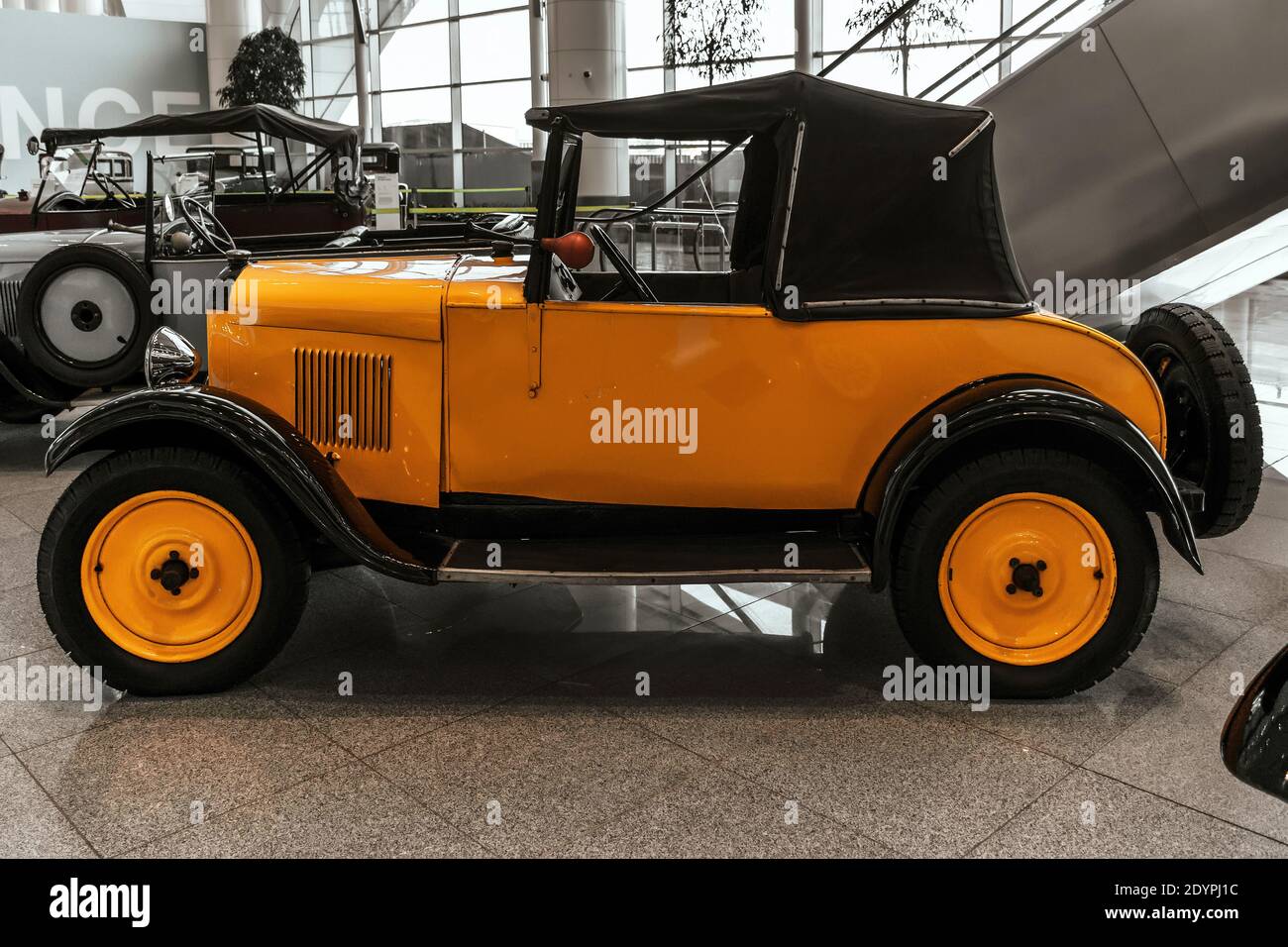 4 June 2019, side view of Peugeot 5CV (yellow) 1925. Classical retro cars of 1920s. Stock Photo