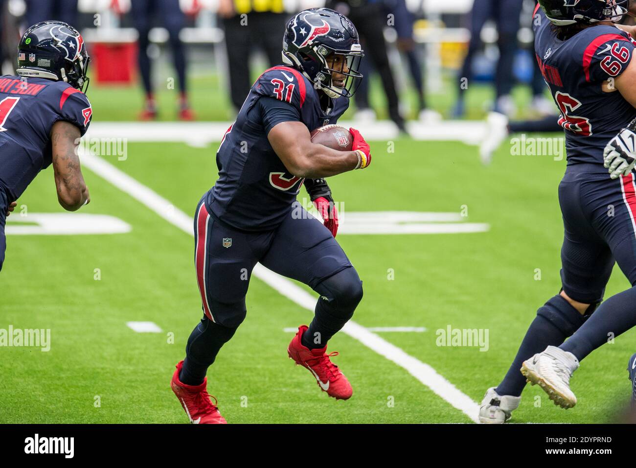 Houston, TX, USA. 12th Sep, 2021. Houston Texans running back David Johnson  (31) leaves the field after an NFL football game between the Jacksonville  Jaguars and the Houston Texans at NRG Stadium