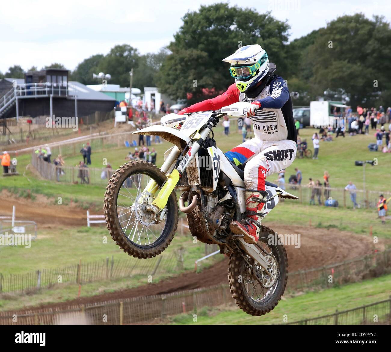 solo motorbike  rider flying through the air on a jump Stock Photo