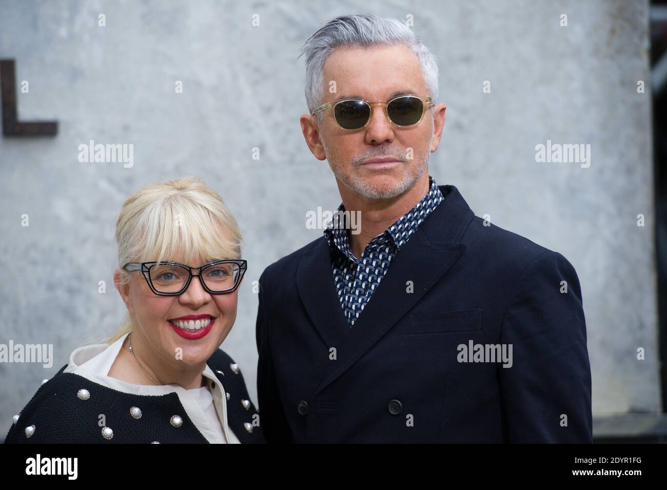 Baz Luhrmann and his wife Catherine Martin posing at Chanel photocall