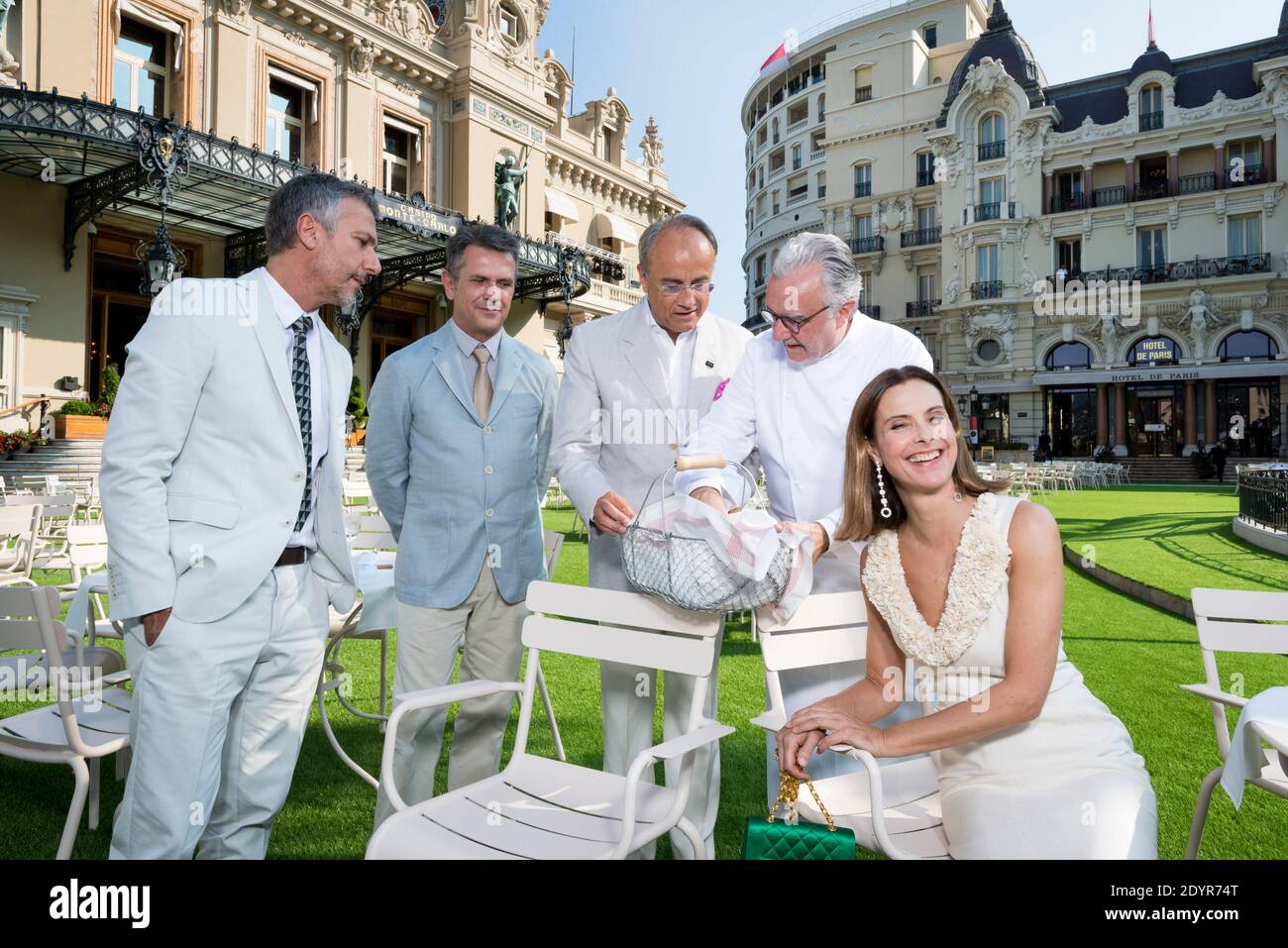 Brazilian designers Fernando Campana and Humberto Campana, executive chairman of Monte-Carlo SBM (Societe des Bains de Mer) Jean-Luc Biamonti, actress Carole Bouquet and French chef Alain Ducasse pose for a photograph in front of the Monte-Carlo's casino during a ceremony marking the 150th anniversary of the SBM in Monte-Carlo, Monaco, on July 5, 2013. Photo by Philippe Petit/Pool/ABACAPRESS.COM Stock Photo