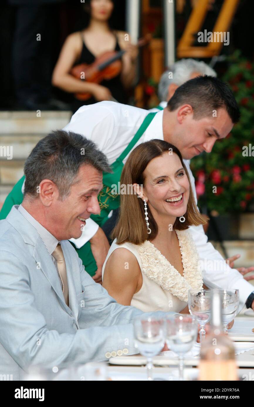 Brazilian designers Fernando Campana and Humberto Campana, executive chairman of Monte-Carlo SBM (Societe des Bains de Mer) Jean-Luc Biamonti, actress Carole Bouquet and French chef Alain Ducasse pose for a photograph in front of the Monte-Carlo's casino during a ceremony marking the 150th anniversary of the SBM in Monte-Carlo, Monaco, on July 5, 2013. Photo by Philippe Petit/Pool/ABACAPRESS.COM Stock Photo