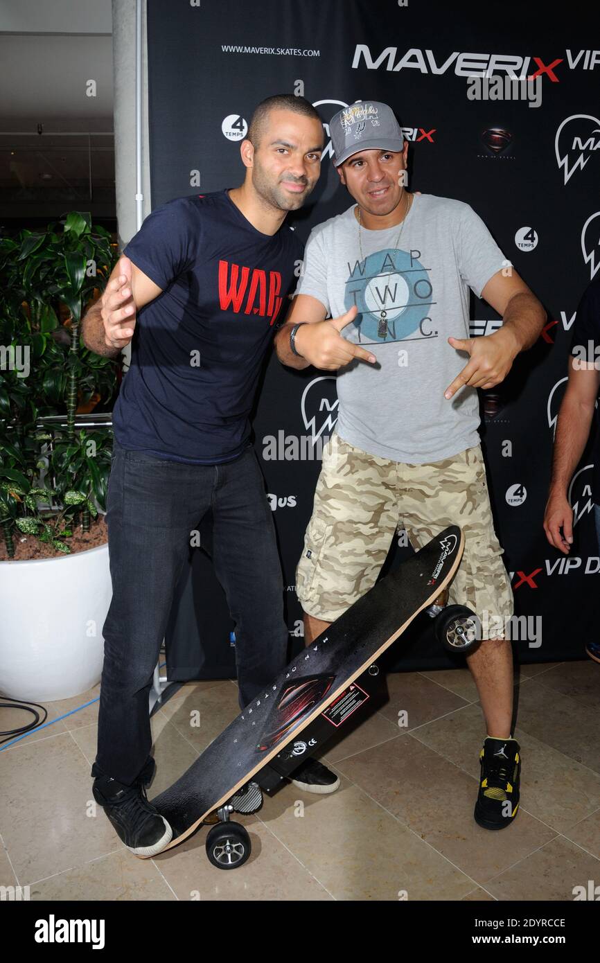 Tony Parker and Cut Killer attending the Maverix Electric Skate  presentation as part of the 'Maverix VIP Day', at the Toys 'R' Us store La  Defense near Paris, France on July 17,