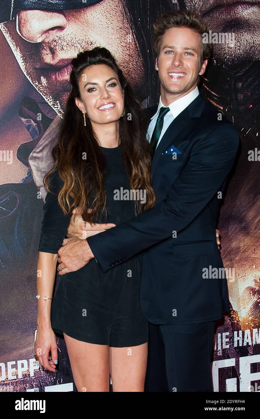 Armie Hammer and girlfriend Elizabeth Chambers attending the French