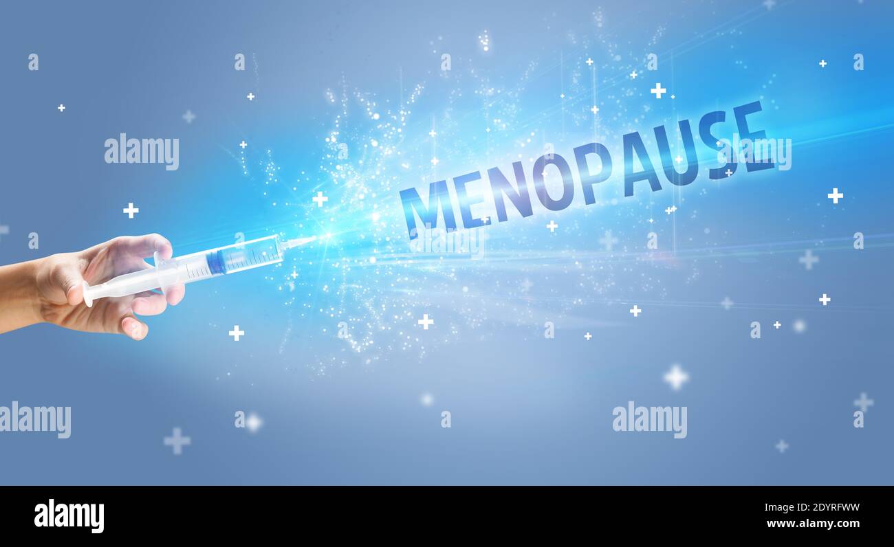 Syringe, medical injection in hand with MENOPAUSE inscription, medical